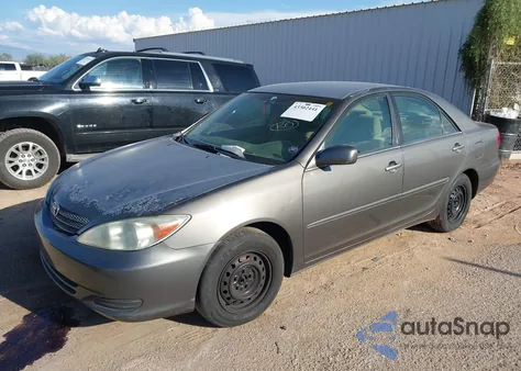 2003 Toyota Camry Le z USA, uszkodzony, nr VIN 4T1BE30K13U725595
